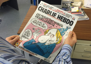 Gunmen kill 12 at French magazine Charlie Hebdo