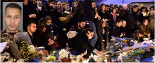 Il cordoglio per la strage di Parigi e nel riquadro il terrorista ancora ricercato
